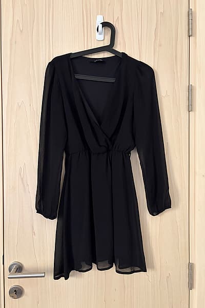 Black long-sleeve wrap dress by New Look — pre-loved on Thrifted.mt