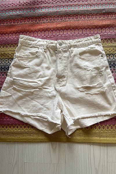 Distressed White Denim Shorts by Terranova — pre-loved on Thrifted.mt