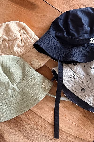 Set of four baby hats — pre-loved on Thrifted.mt