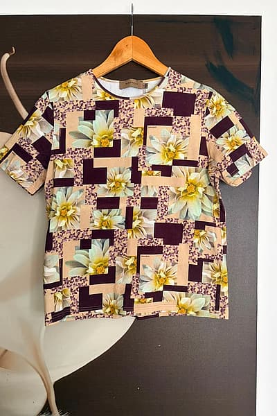 Nina Ricci floral graphic t-shirt by Nina Ricci — pre-loved on Thrifted.mt