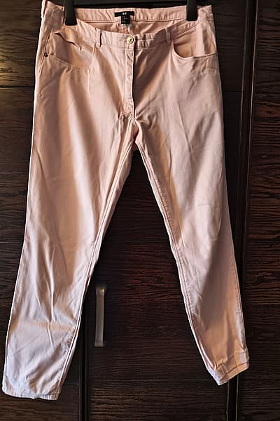 Light pink H&M trousers by H&M — pre-loved on Thrifted.mt