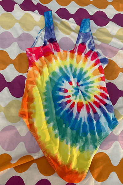 Rainbow kids swimsuit by No brand — pre-loved on Thrifted.mt