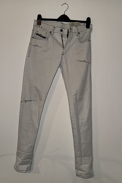 Diesel Distressed Slim Tapered Jeans by Diesel — pre-loved on Thrifted.mt
