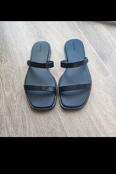 Calvin Klein Black Flat Sandals by Calvin Klein — pre-loved on Thrifted.mt