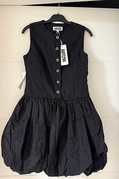 Black button-down bubble dress by AMYLYN — pre-loved on Thrifted.mt