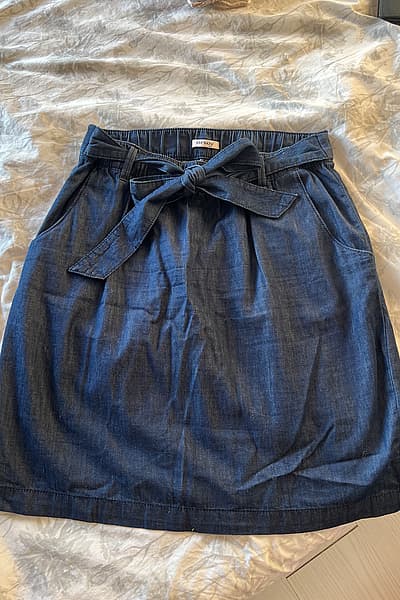 Orsay denim tie waist skirt by Orsay — pre-loved on Thrifted.mt