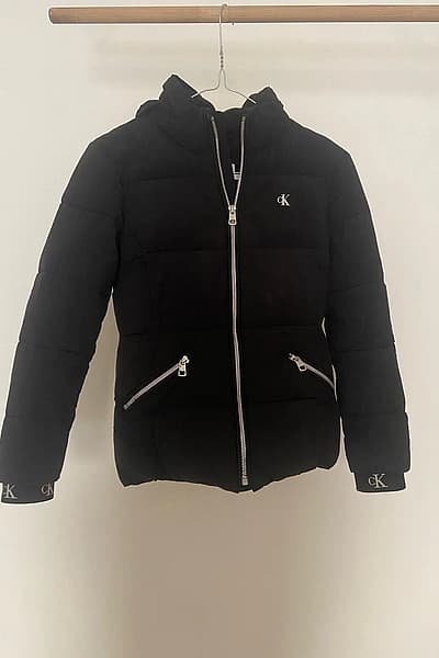 Calvin Klein Black Puffer Jacket by Calvin Klein — pre-loved on Thrifted.mt