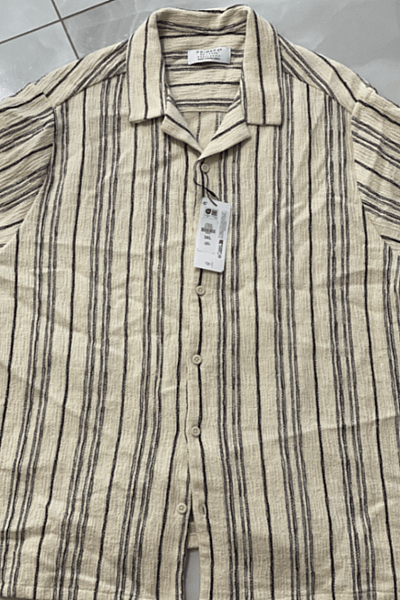 Striped textured button-down shirt by Primark — pre-loved on Thrifted.mt