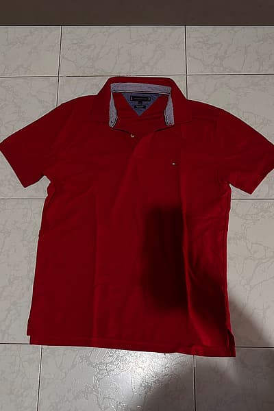 Red Tommy Hilfiger Polo Shirt by Tommy Hilfiger — pre-loved on Thrifted.mt