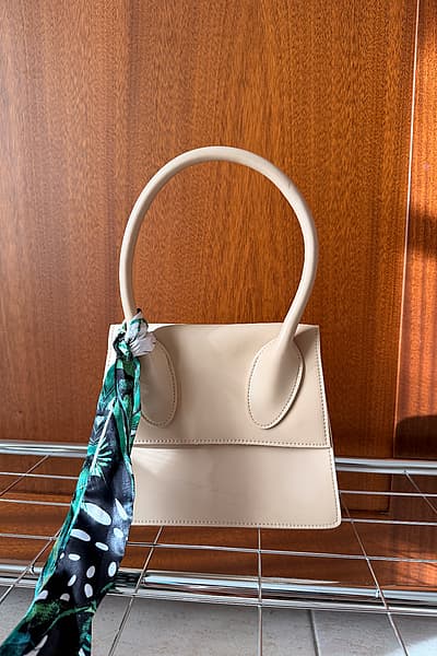 Miniso Beige Mini Handbag — pre-loved on Thrifted.mt