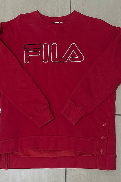 Fila Red Graphic Sweatshirt by Fila — pre-loved on Thrifted.mt