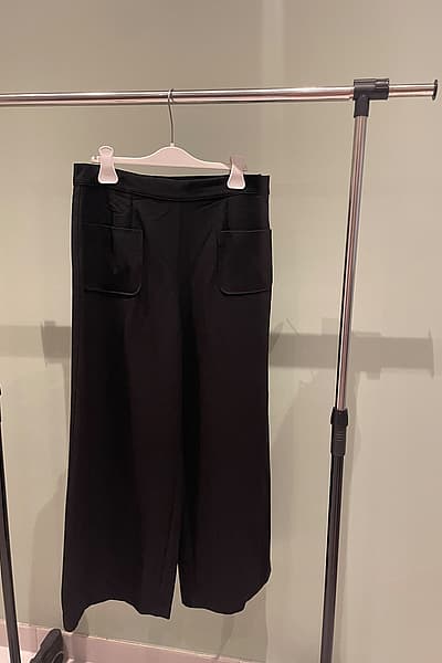Black wide-leg tailored trousers by Promod — pre-loved on Thrifted.mt