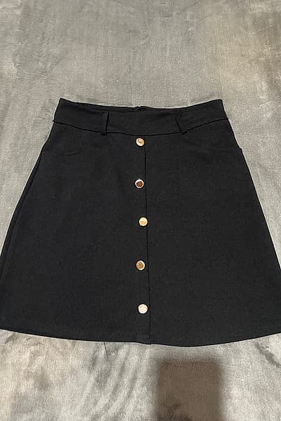 Black Button Mini Skirt — pre-loved on Thrifted.mt