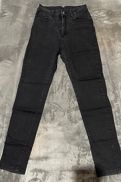 Classic black slim-fit jeans by SHEIN — pre-loved on Thrifted.mt