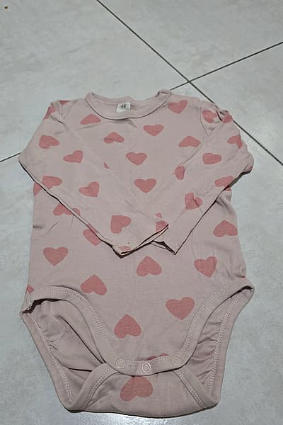 H&M Pink Heart Print Baby Bodysuit by H&M — pre-loved on Thrifted.mt