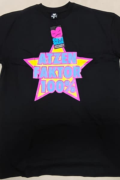 Black Graphic Slogan T-shirt by Orgi Wear — pre-loved on Thrifted.mt