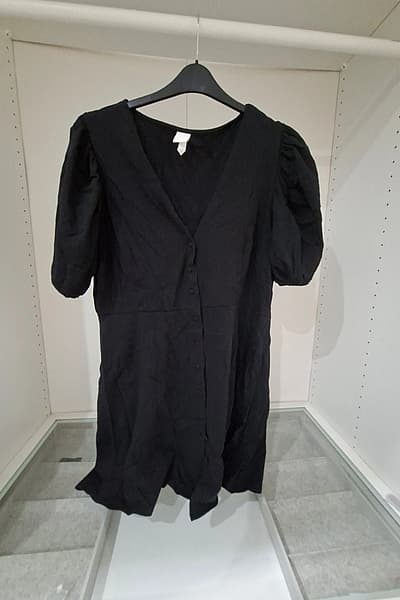 Black puff sleeve button dress by H&M — pre-loved on Thrifted.mt