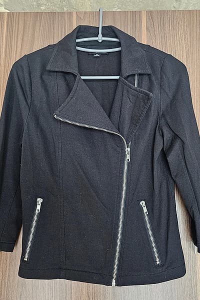 Black Biker Style Jacket by Xxi — pre-loved on Thrifted.mt