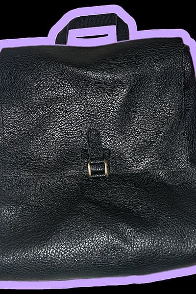 Black Pebbled Faux Leather Flap Backpack (Minimalist Style) — pre-loved on Thrifted.mt