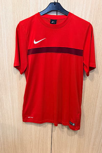 Red Nike Dri-Fit T-Shirt by Nike — pre-loved on Thrifted.mt