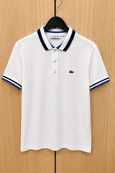 Lacoste White Tipped Polo Shirt by Lacoste — pre-loved on Thrifted.mt