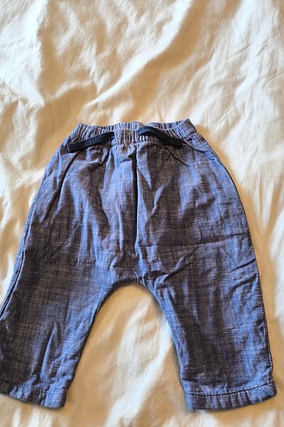 Baby blue cotton trousers by next baby — pre-loved on Thrifted.mt