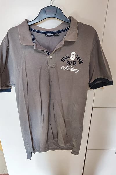 Grey polo shirt — pre-loved on Thrifted.mt
