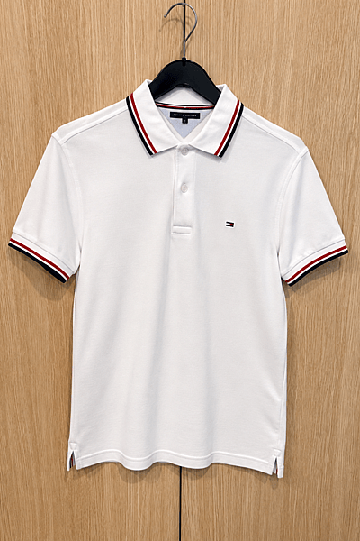 Tommy Hilfiger White Polo Shirt by Tommy Hilfiger — pre-loved on Thrifted.mt