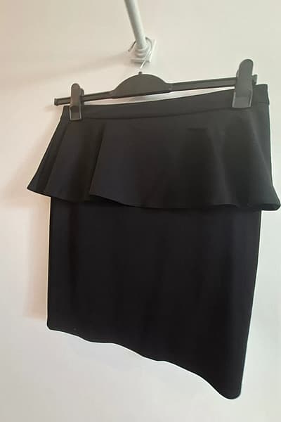 Black peplum mini skirt by Atmosphere — pre-loved on Thrifted.mt