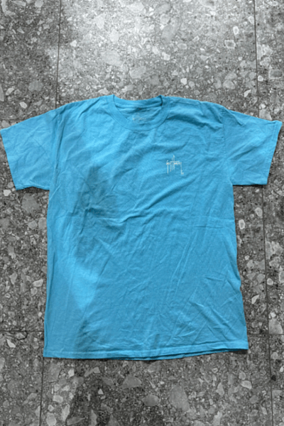 Guy Harvey Blue Graphic T-Shirt by Guy Harvey — pre-loved on Thrifted.mt