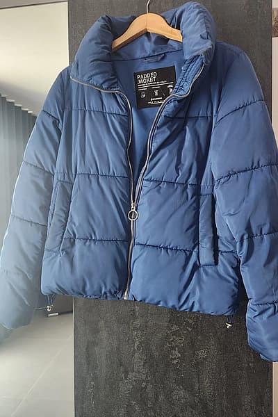 Blue Padded Winter Jacket by Stradivarius — pre-loved on Thrifted.mt