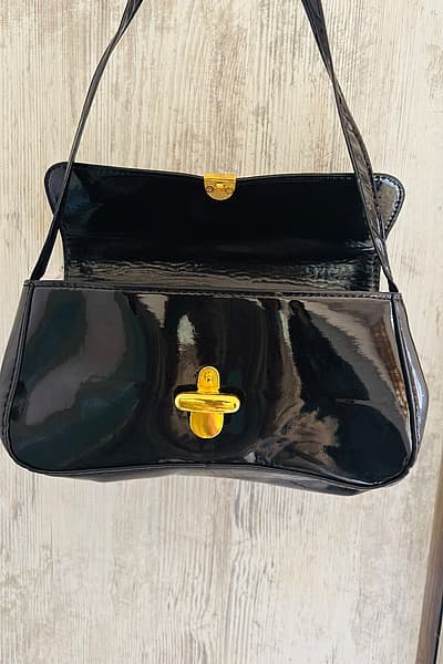 Black patent leather handbag by Local — pre-loved on Thrifted.mt