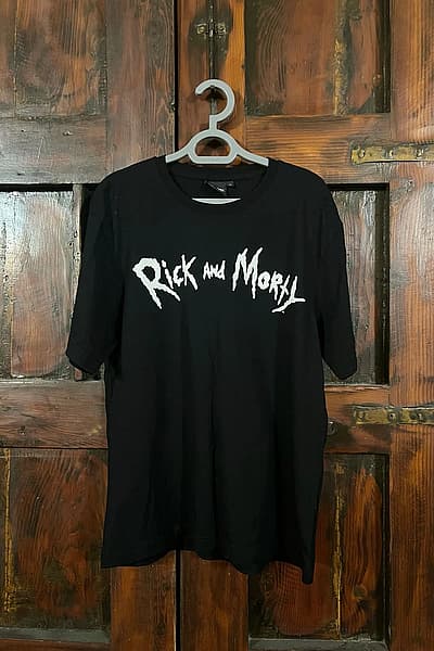 Black Rick and Morty T-Shirt by Rick & Morty — pre-loved on Thrifted.mt