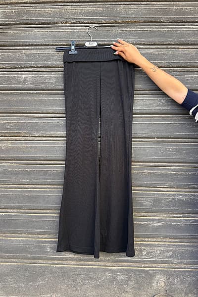 Black Fold-Over Flared Trousers by Shein — pre-loved on Thrifted.mt