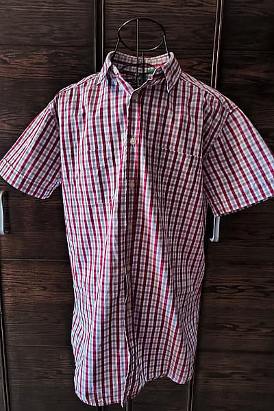 Benetton red checked button shirt by Benetton — pre-loved on Thrifted.mt