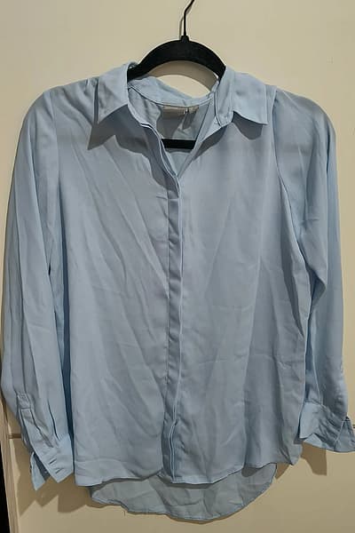 Light blue button-down shirt by Asos — pre-loved on Thrifted.mt