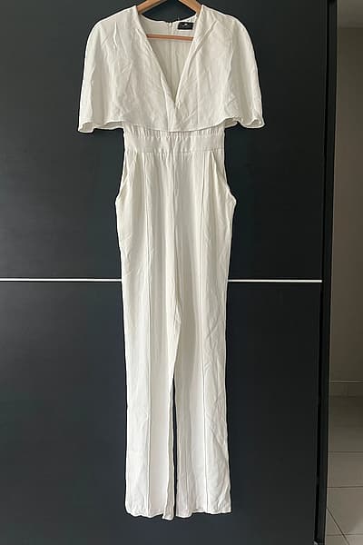 Elisabetta Franchi White Cape Jumpsuit by Elisabetta Franchi — pre-loved on Thrifted.mt