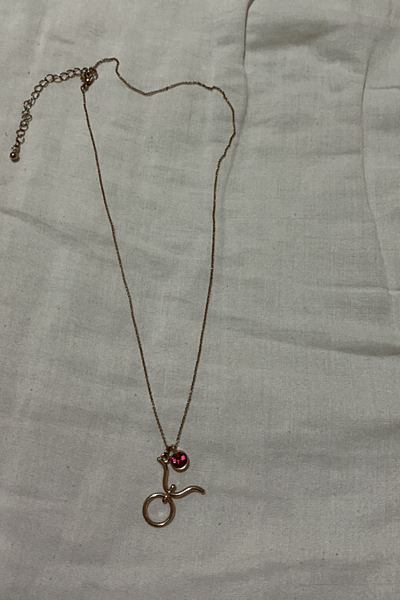 Taurus Gold Tone Pink Stone Necklace — pre-loved on Thrifted.mt