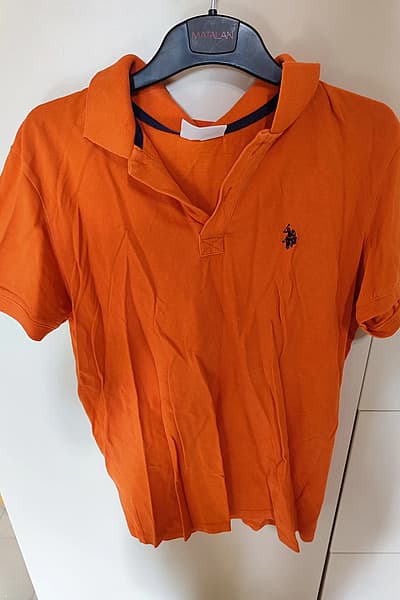 Orange polo shirt — pre-loved on Thrifted.mt