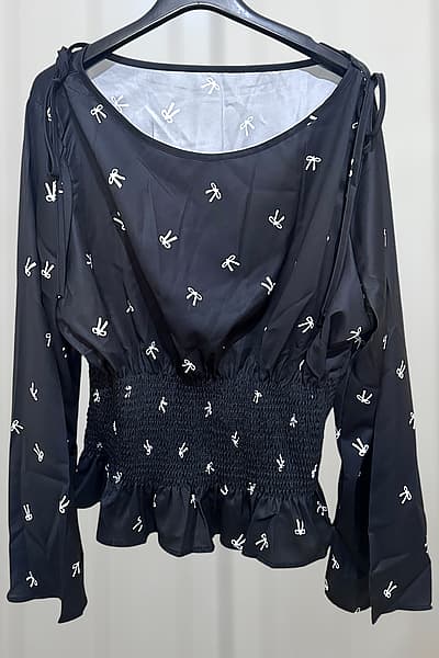 Shein Curve Brand New Black long-sleeve blouse with white bow print and scoop neckline with ties by Shein  — pre-loved on Thrifted.mt