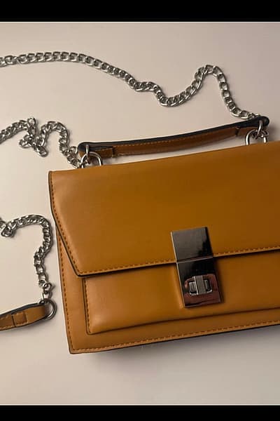 New Mustard Yellow Chain Crossbody Bag by House Accessories — pre-loved on Thrifted.mt