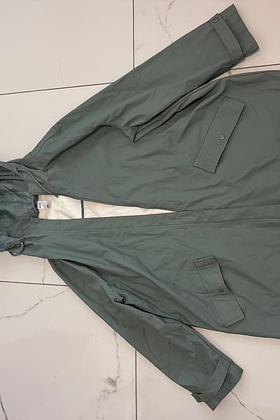 Green hooded raincoat jacket by anko — pre-loved on Thrifted.mt