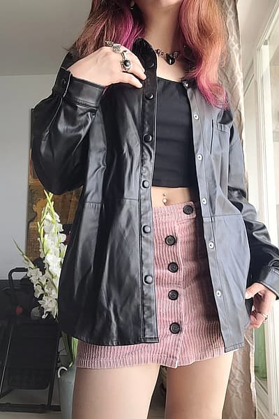 Black faux leather jacket by Pink Woman — pre-loved on Thrifted.mt