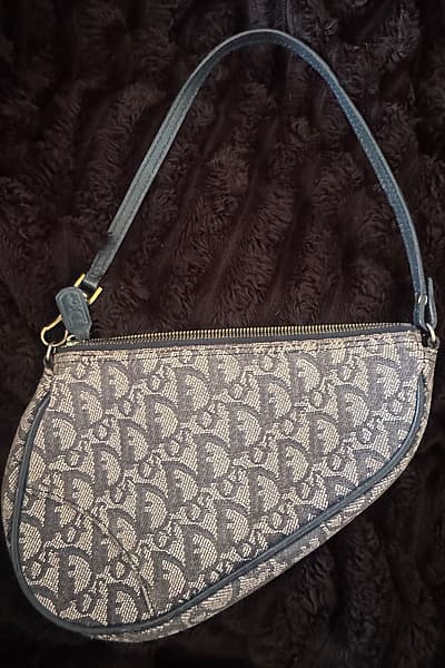 Christian Dior Trotter Saddle Bag by Christian Dior — pre-loved on Thrifted.mt