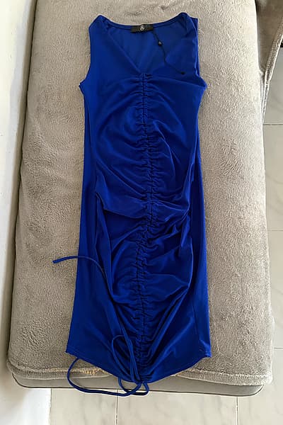 Blue ruched mini dress by Missguided — pre-loved on Thrifted.mt