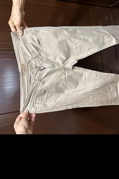 Beige Trousers by Claudio Tones — pre-loved on Thrifted.mt