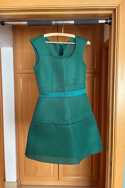 Green sleeveless structural mini dress by Sisley — pre-loved on Thrifted.mt