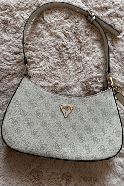 Guess hand bag by Guess — pre-loved on Thrifted.mt