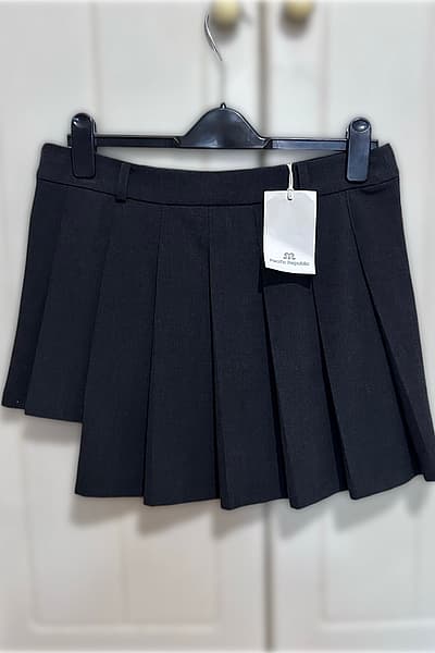 Pull and Bear Brand New Dark Grey Pleated Asymmetric Mini Skirt by Pull and Bear — pre-loved on Thrifted.mt