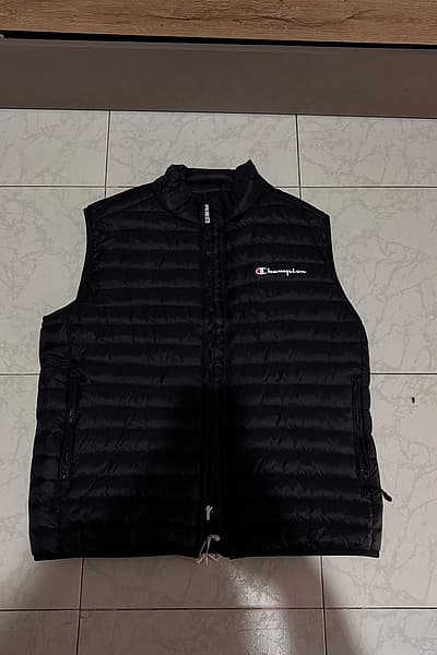 Champion Padded Quilted Gilet by Champion — pre-loved on Thrifted.mt